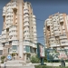 O femeie s-a trezit cu o bucată de tencuială în cap, căzută de pe fațada blocului turn SR2