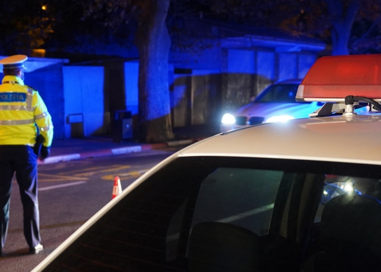 Echipaj de poliție în trafic. FOTO Cătălin SCHIPOR