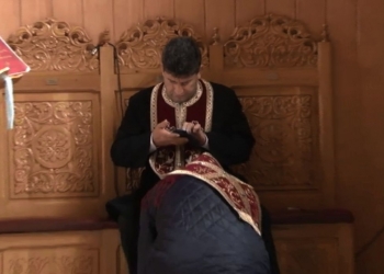 Preot Andrei Salomia. FOTO: Captură video