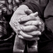 The old couple holding hands